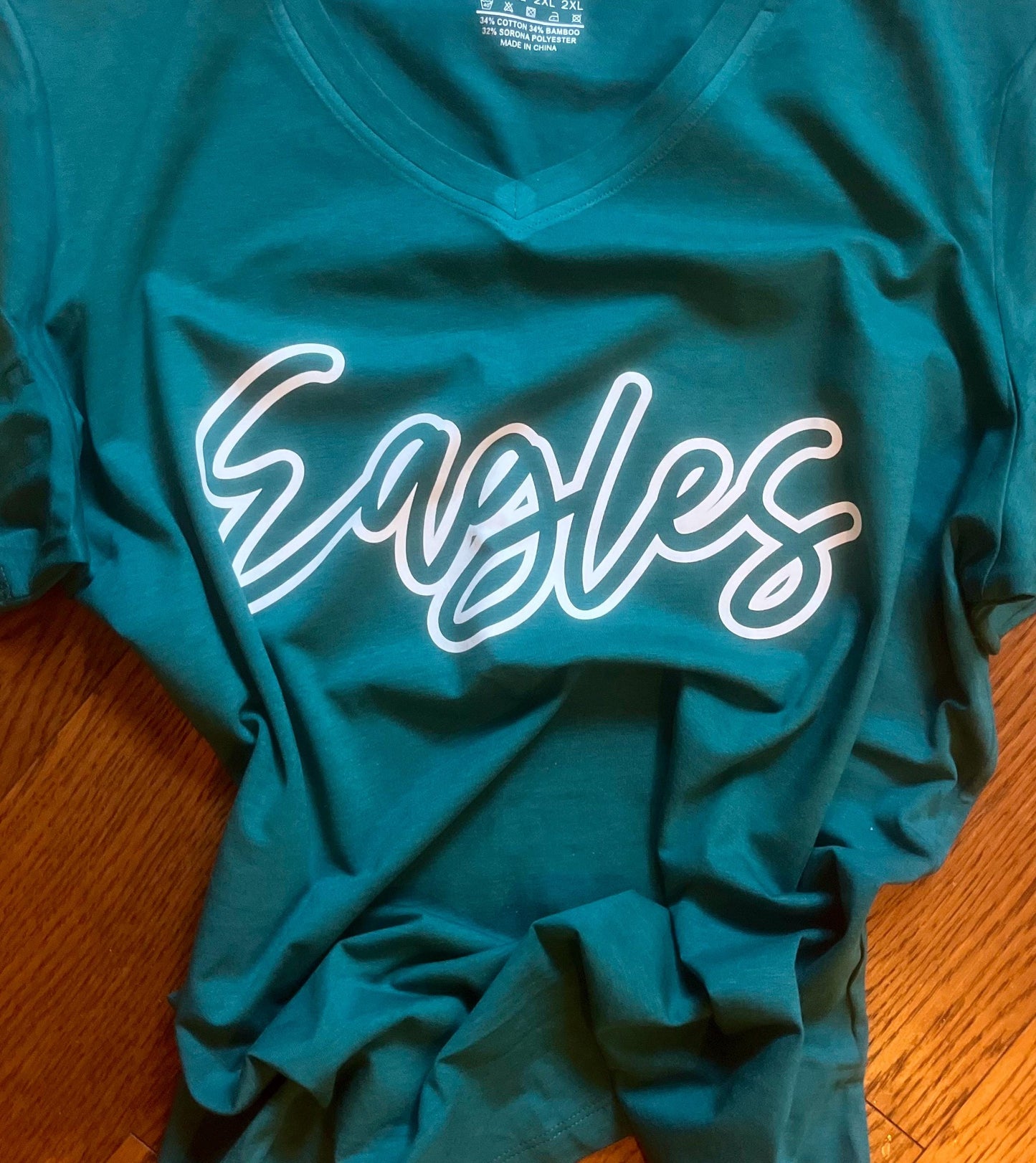 eagles cursive outline v-neck shirt